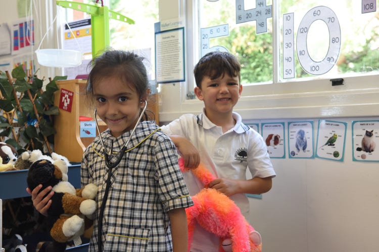 Children in class playing
