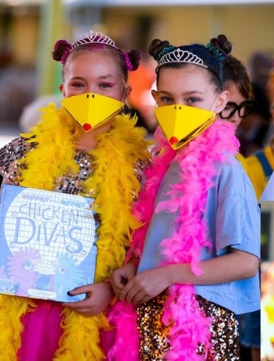 students dressed as chicken divas for book week
